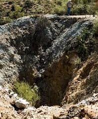 Car plunges into mineshaft, 2 Dead, 1 Missing