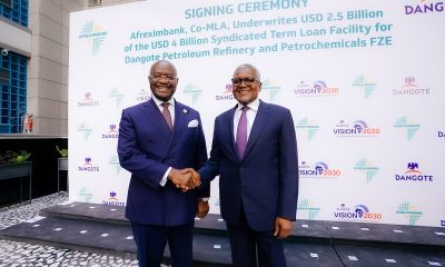 Dr. George Elombi (left), President and Chairman of the Board of Directors of Afreximbank, poses with Mr. Aliko Dangote (right), President and Chief Executive of Dangote Industries Limited, following the signing of a US$2.5 billion facility underwritten by the Bank as part of the Group's Vision 2030 expansion strategy