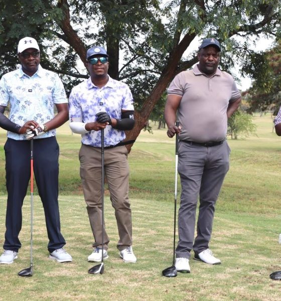 Game faces on: NetOne golfers await their moment on the tee.