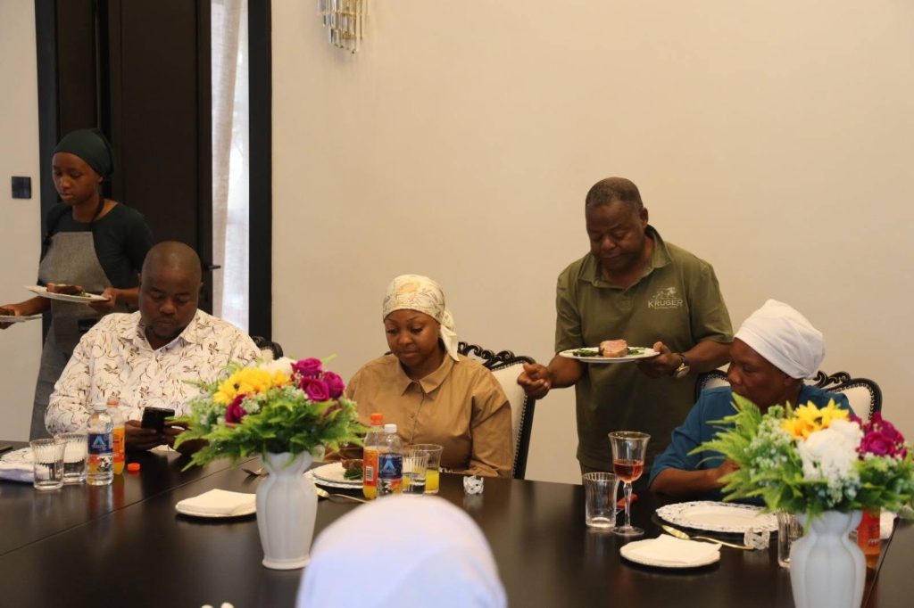 Picture Caption: Businessman Sir Wicknell Chivayo and his wife share a meal with ZCC leader Bishop Nehemiah Mutendi during a courtesy visit to his rural home in Defe, Gokwe, where discussions centered on faith, philanthropy and community development initiatives.