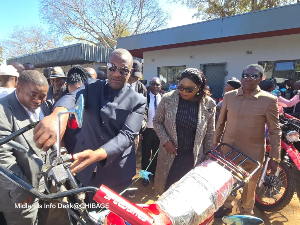 Minister of State for Provincial Affairs and Devolution for Midlands Province, Hon. Owen "Mudha" Ncube (centre), commissions Zibagwe Rural District Council's new office block and officially hands over four utility vehicles and 43 motorbikes to councillors in Kwekwe on Thursday. The assets, procured through the council's internally generated revenue, are expected to strengthen service delivery and improve community outreach across the district.