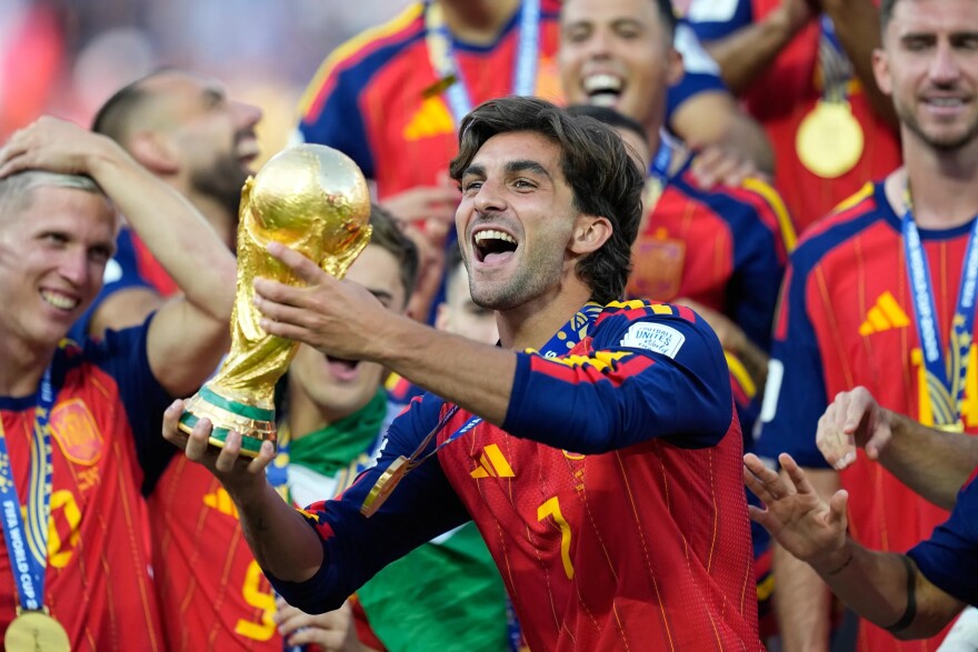 Spain's players celebrate after securing a 1-0 victory over Argentina to win the 2026 FIFA World Cup, a triumph that drew renewed attention to Prophet Passion Java's earlier public prediction that Spain would become world champions.